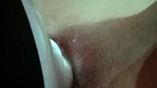 shaved wet pussy vibrates with toy massager fingering