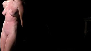 Slim blonde endures various bondages and torments in session