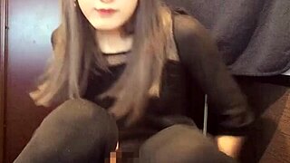 check out this cute japanese ladyboy stroking her cock solo