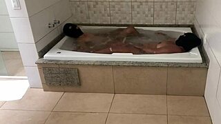 we were relaxing in the tub and i couldn't resist giving my ass to the young guy