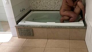 we were relaxing in the tub and i couldn't resist giving my ass to the young guy