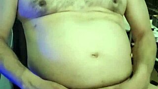 Curvy Ezsosa flashes fat tits and cock in wild bedroom exhibition