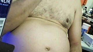 Curvy Ezsosa flashes fat tits and cock in wild bedroom exhibition