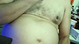 Curvy Ezsosa flashes fat tits and cock in wild bedroom exhibition