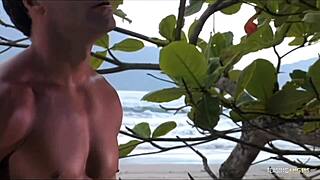 a fantastic beach anal with lush brunette deepthroating riding big cock