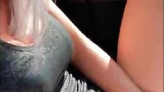 blonde fingers pussy to orgasm in public car