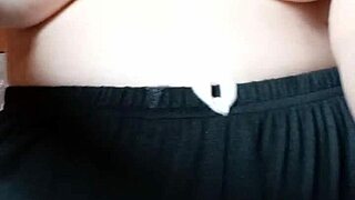 pregnant milf squeezes out her massive tits and hard nipples