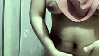 bu guru hijab teacher shakes natural tits baring big pussy solo dance