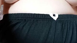 pregnant milf squeezes out her massive tits and hard nipples