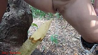 Perverted slut impales pussy on stake squirts piss forest