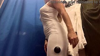 Wow milf's huge boobs bursting out while trying sexy dresses in changing room!!