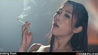 Leather-clad Emiri smokes while riding cock to explosive cumshots
