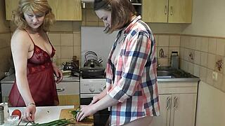 Blonde milf and cute young girl strip lingerie in kitchen revealing perfect asses and puffy pussies up close