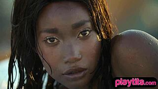 petite ebony milf slowly strips by the pool revealing juicy tits