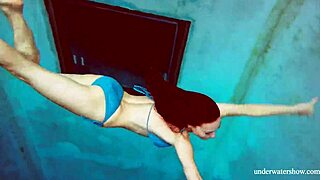 blue bikini clings to her tight pussy underwater teasing every curve