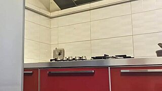 hot babe cleans stove then fingers big ass tits wildly