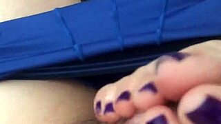 her purple toes wrap around cock for footjob