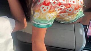 Playing with big black cock in the car outdoors