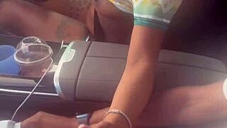 Playing with big black cock in the car outdoors