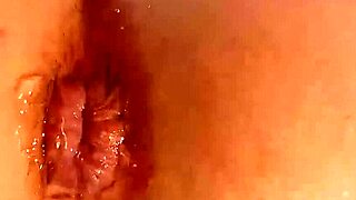 curious shemale camgirl teases viewers plunging dildo deep into her tight ass