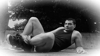 muscular bodybuilder kicks pants off mid-kickboxing story then jerks huge cock workout style