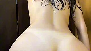 Young woman straight out of the shower in dorm