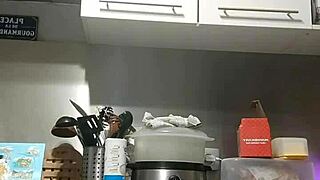 young redhead girlfriend fucks herself hard with dildo on kitchen counter