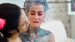 anal slut with small tits and tattoos fists her gaping asshole with extreme dildos