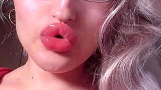bimbo goddess in red lipgloss dominates webcam with financial fetish talk