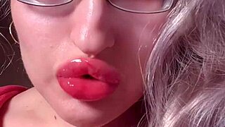 bimbo goddess in red lipgloss dominates webcam with financial fetish talk