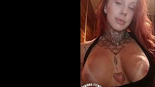 Hot Redhead Teases Webcam with Pink Nipples!