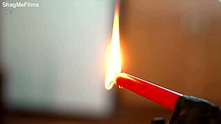 Her heart races as hot wax punishes fit milf's wet pussy deeply