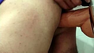 She plugs her ass then takes double anal dildo penetration