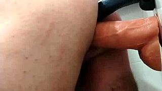 She plugs her ass then takes double anal dildo penetration