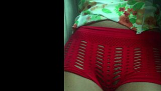 Her shorts barely hide that juicy shaved pussy teasing for a peek.