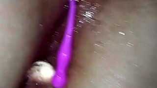 Wife spreads pussy wide with thick dildo toy