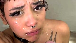 yo, check out this goth girl downing piss like a champ in her first deepthroat cumshot session