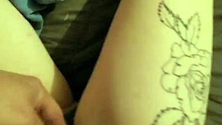 hot fingering deep in striped cotton panties while stripping slow