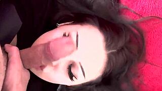 cutie poses her pretty face right by that massive throbbing cock