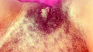 she spreads wide revealing her bushy hairy black ebony pretty pussy closeup