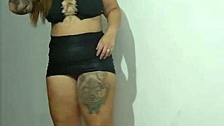 Solo girl masturbates hard flashes tits at table corner