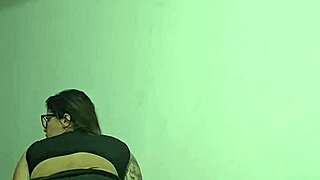 Solo girl masturbates hard flashes tits at table corner