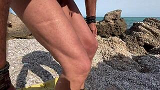 On the beach little milf masturbates huge cock until explosive cumshot accident