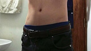 i strip half naked in the work bathroom to masturbate with a monster cumshot