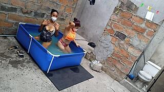 Athletic Indian and curvy Latina bask sensually poolside