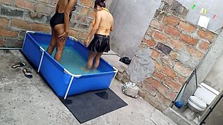 Athletic Indian and curvy Latina bask sensually poolside