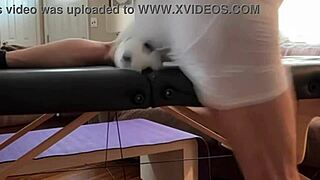 Groin stretch strains tight spandex shorts over bulging balls!