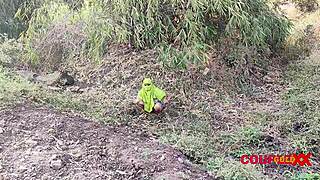 Naughty Komal Pees in Fields Baring Big Ass and Shaved Pussy