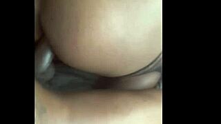 Black amateur couple bends over sofa for doggystyle pounding
