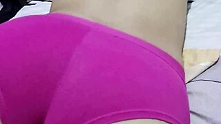 skinny muscular bodybuilder lies spread on bed fingering shaved pussy to orgasm